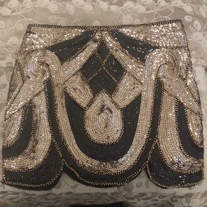 Amazing sequin mini skirt with tulip cut